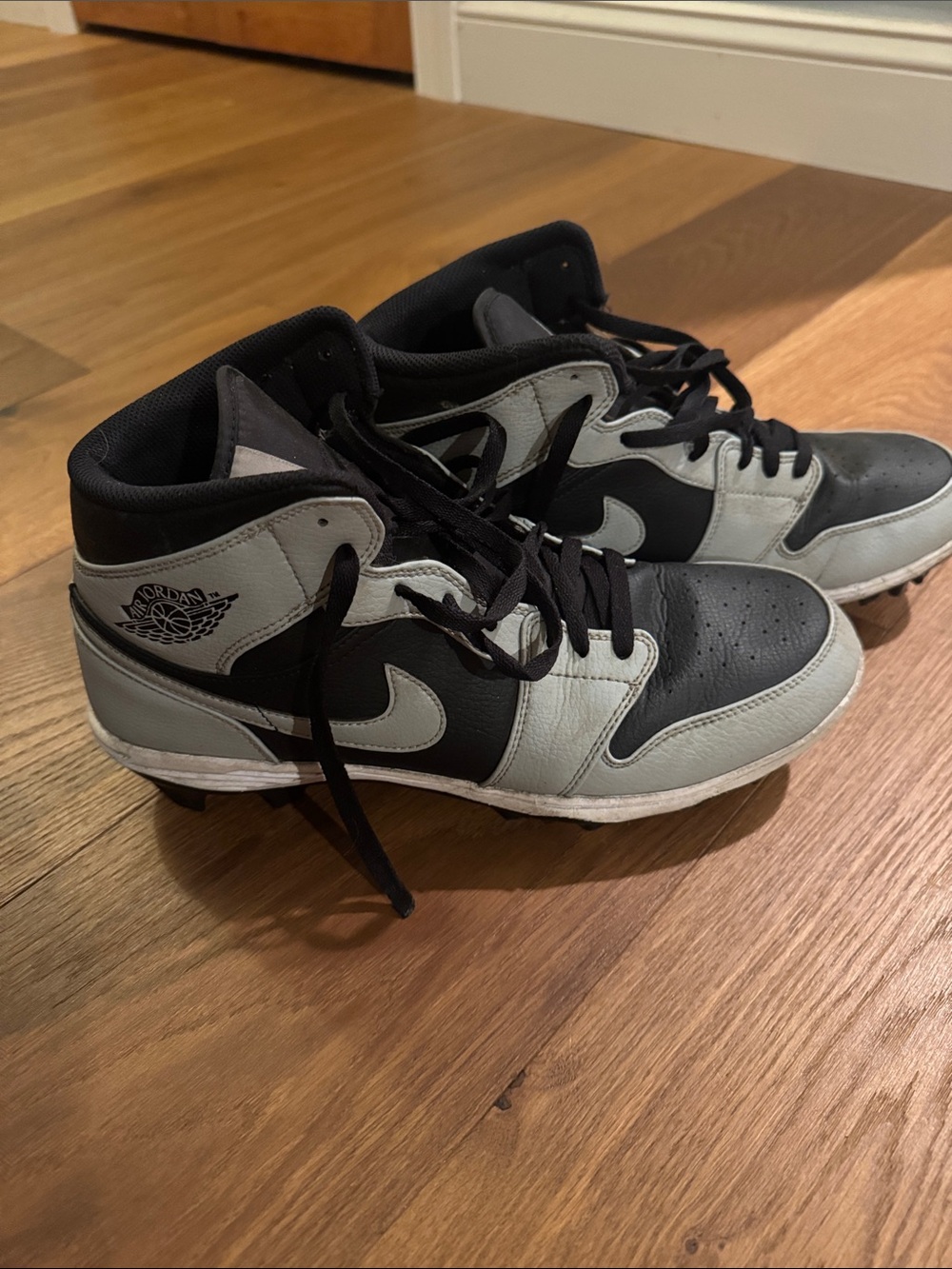 Jordan Men’s Mid-Top Football/Lacrosse Cleats in Black and Gray
